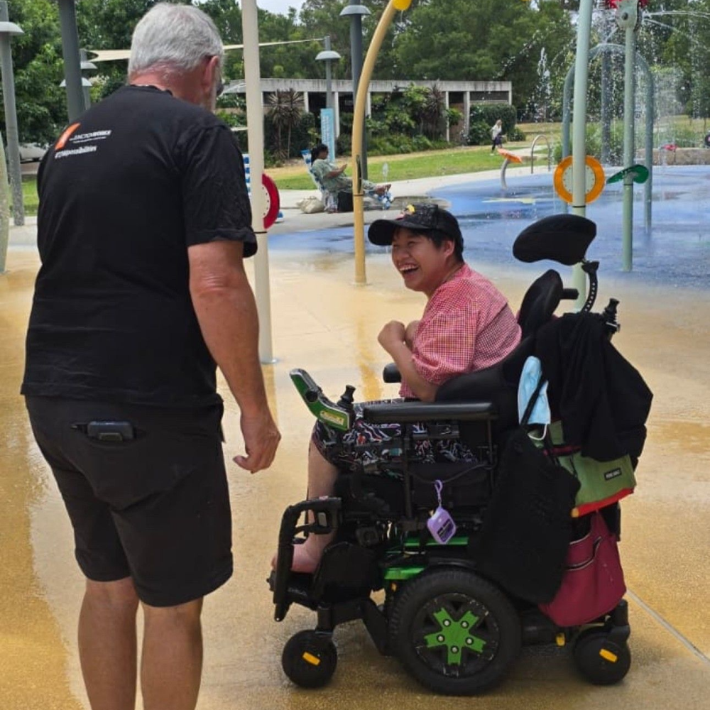 NDIS participant outdoor water play activity | The Junction Works